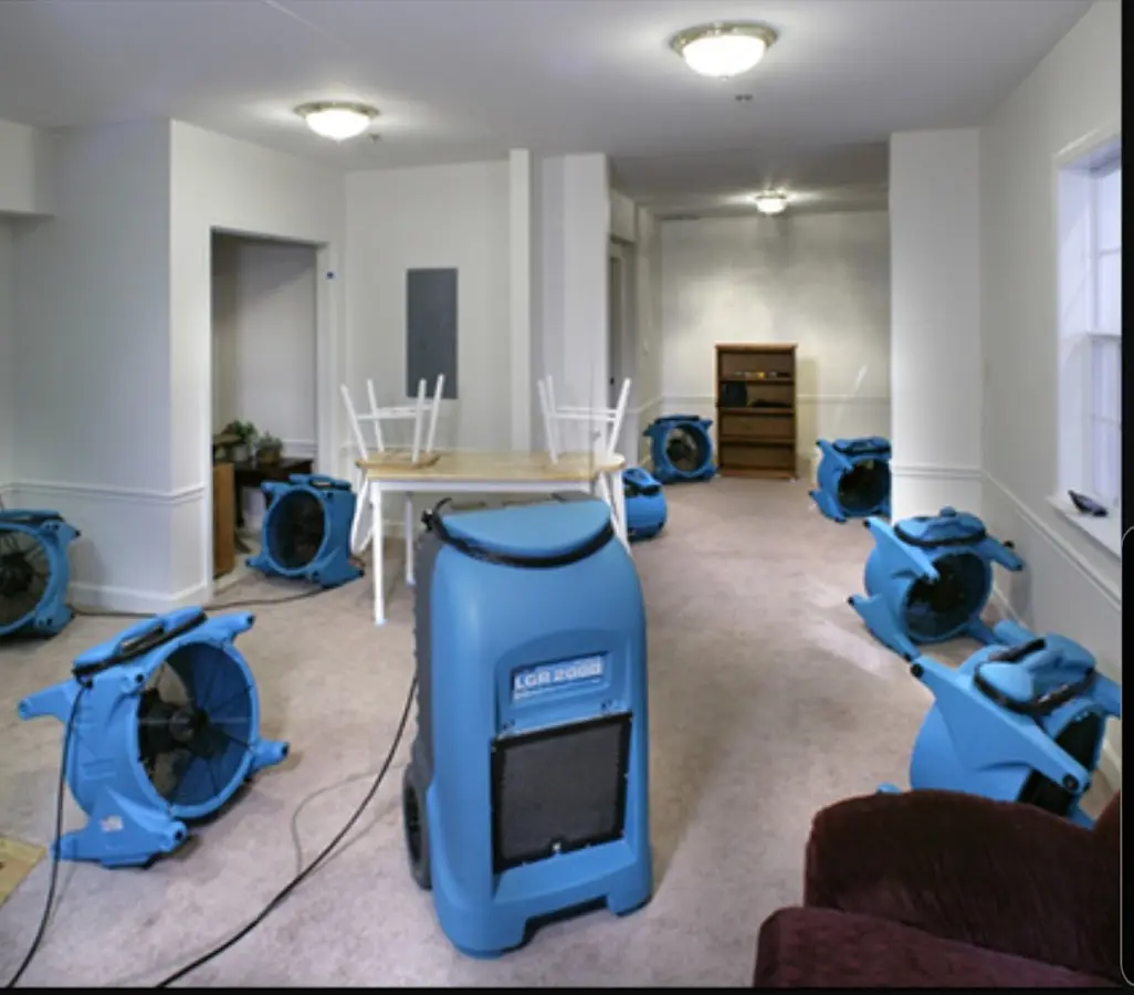 Air movers and dehumidifier setup for Water Damage Restoration in Cohoes